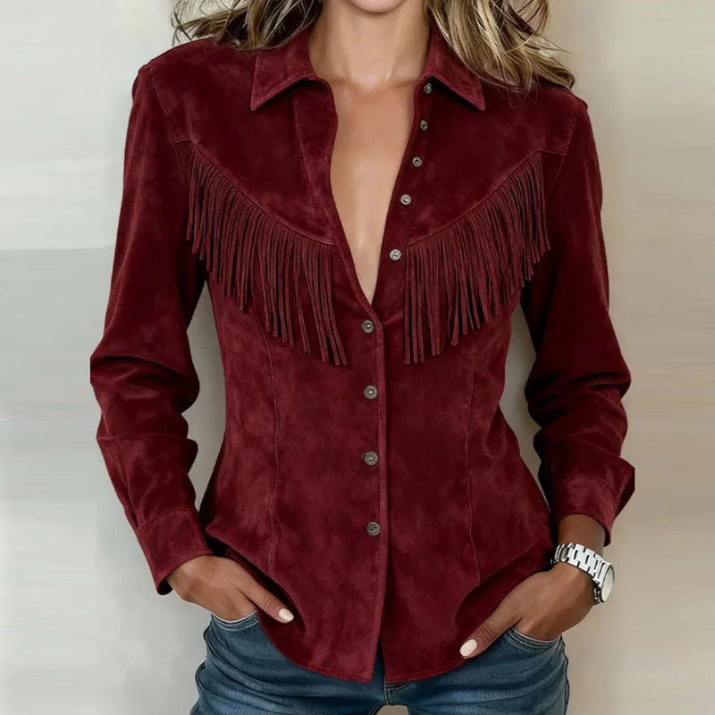 Woman wearing dark red fringe suede-look jacket with button front