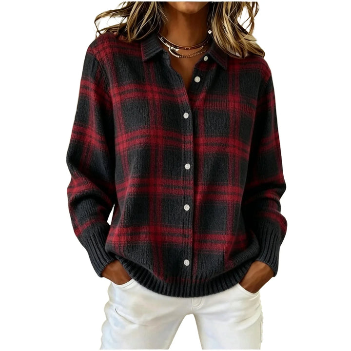 Woman wearing red and navy plaid knit button front cardigan