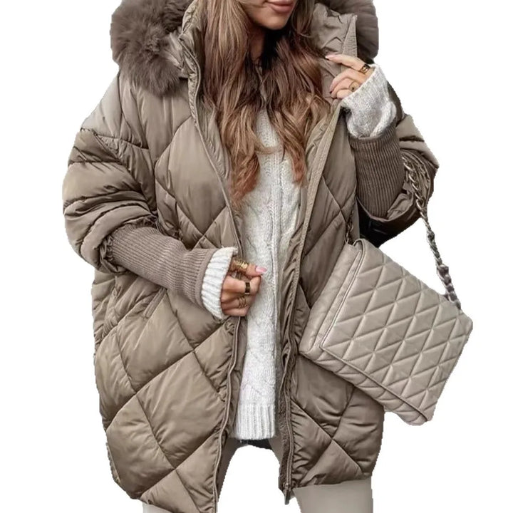 Taupe quilted puffer coat with faux fur hood on mannequin form