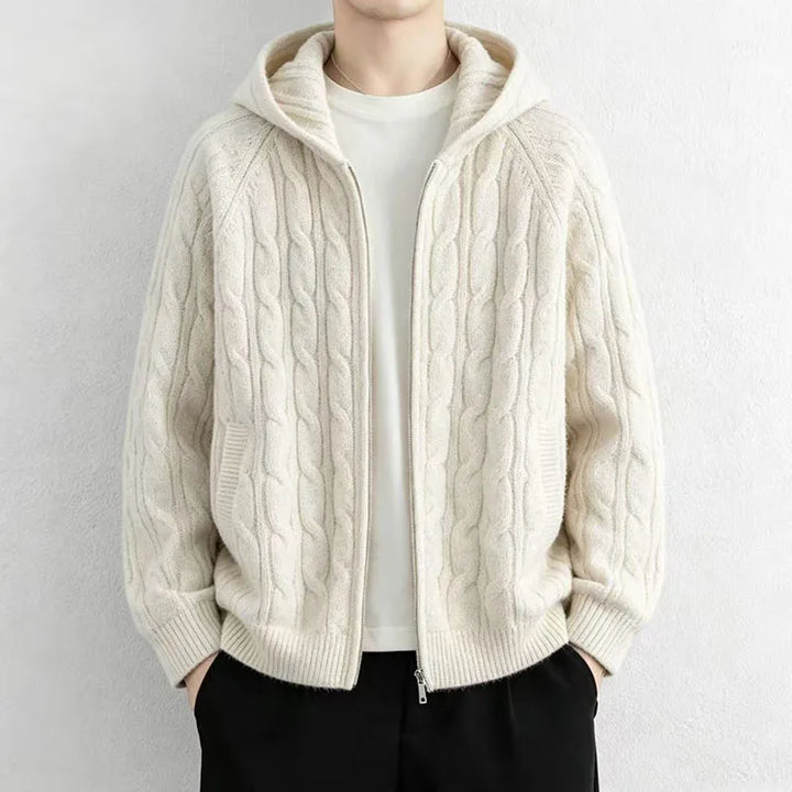 Man wearing apricot cable knit hooded cardigan with front zip