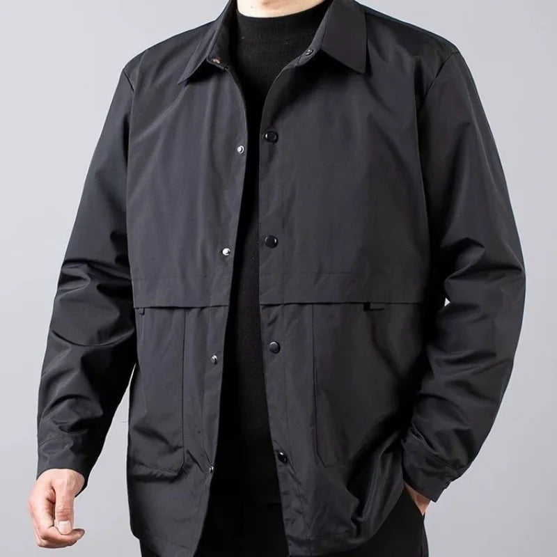 Man wearing black shirt jacket, close front view