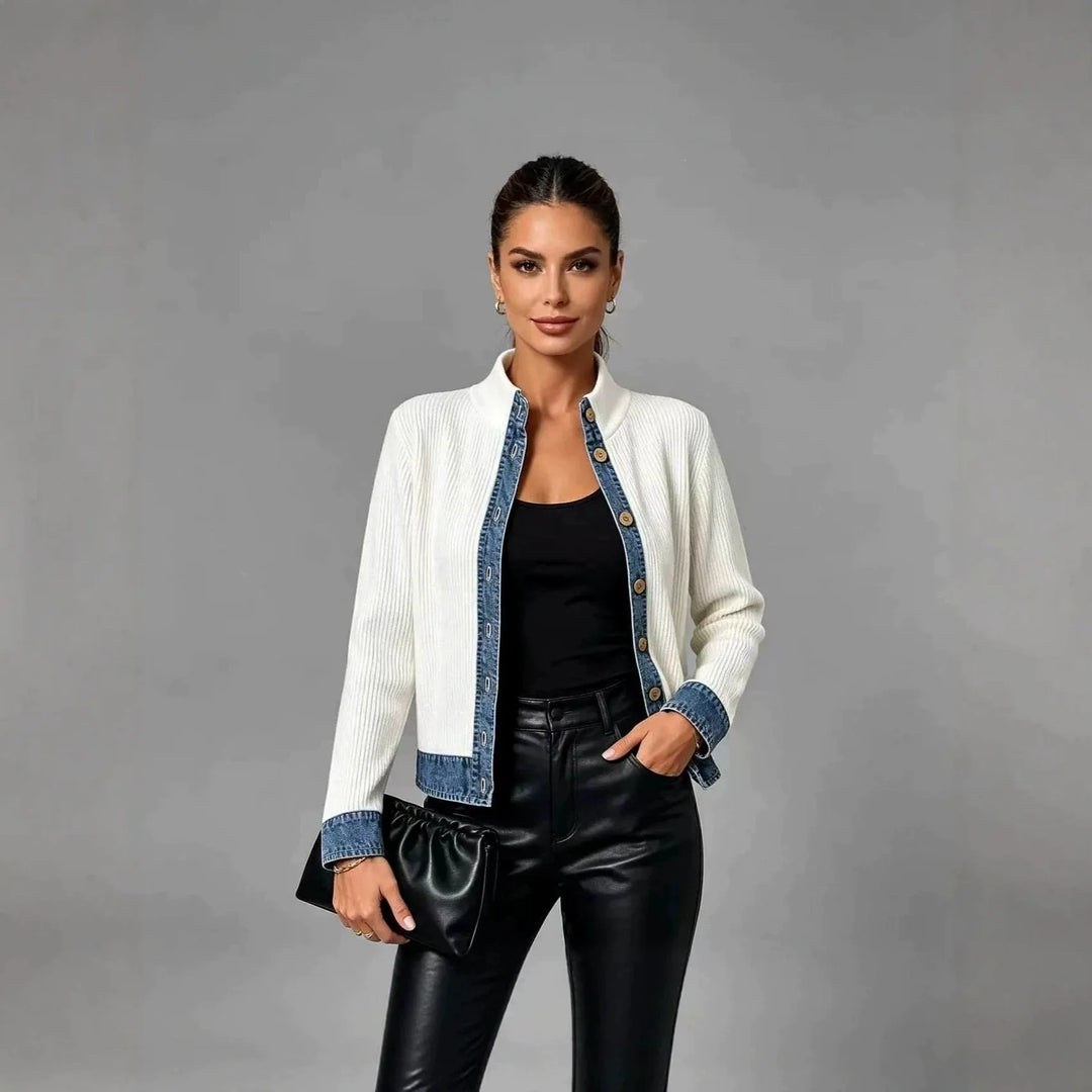 Woman wearing white ribbed cardigan with denim trim, front view