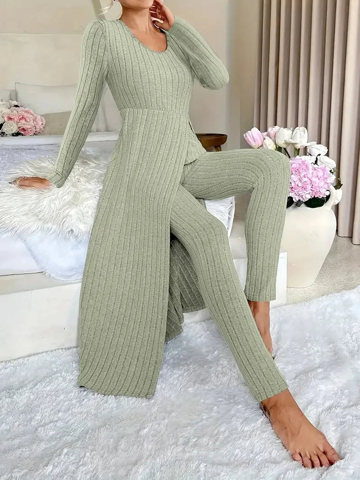 Woman wearing matcha green ribbed long slit two piece loungewear set seated