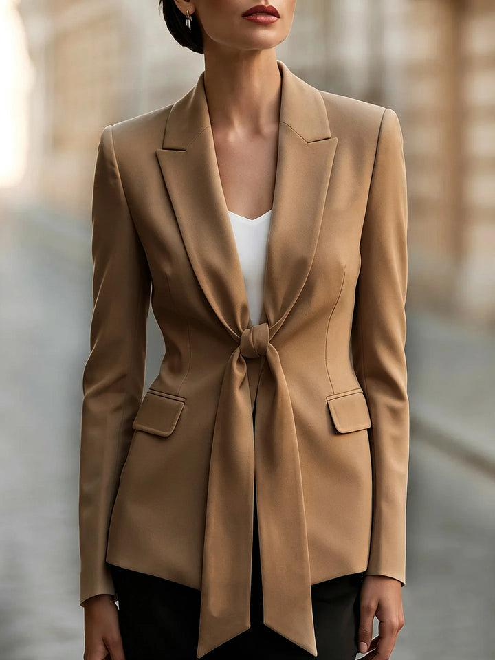 Khaki blazer with front tie knot and flap pockets