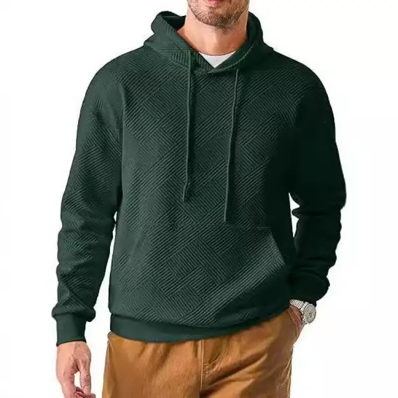 Man wearing green textured knit pullover hoodie