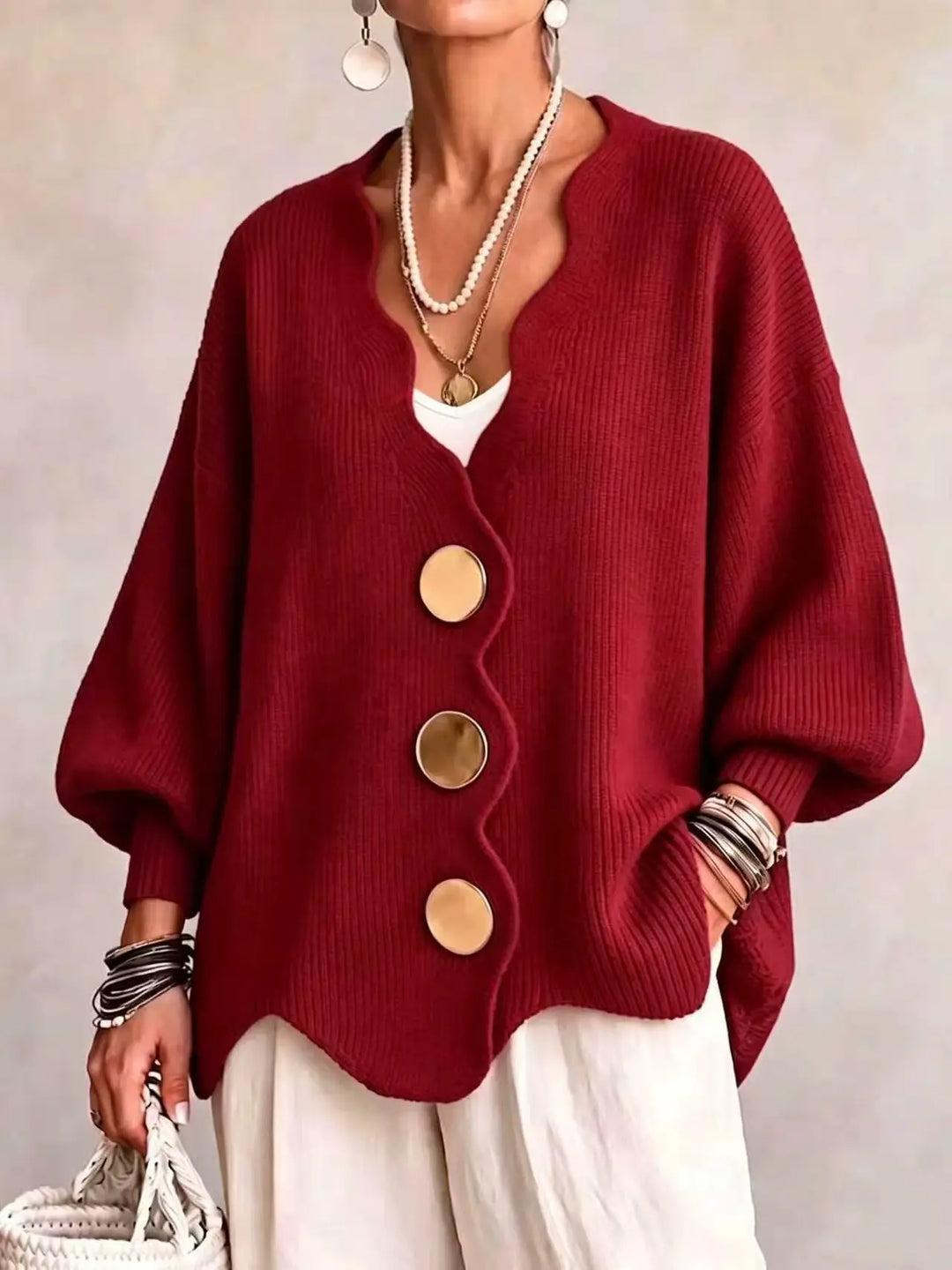 Red oversized cardigan with wavy scalloped edge