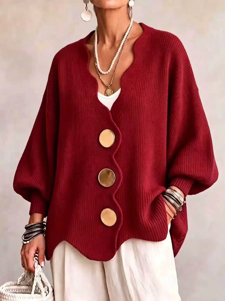Red oversized cardigan with wavy scalloped edge