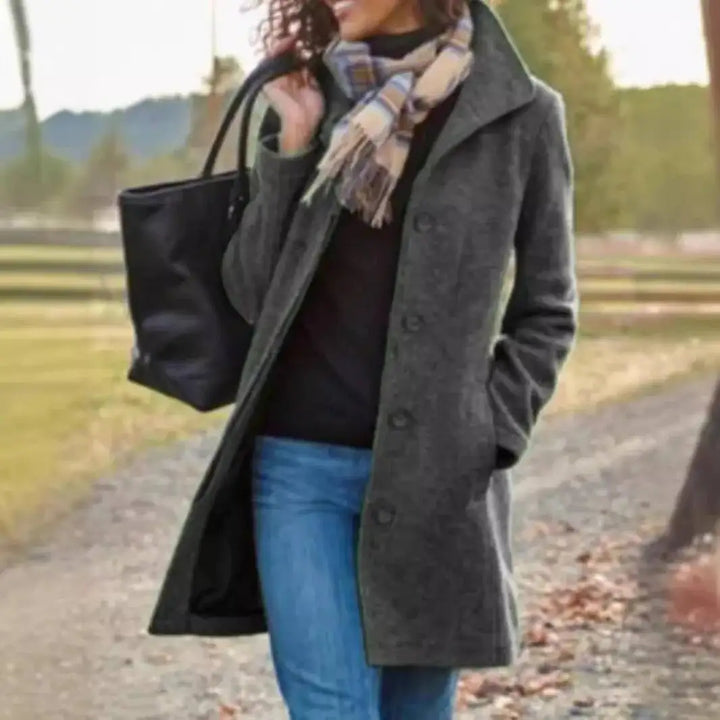 Close view of grey wool coat with turn down collar
