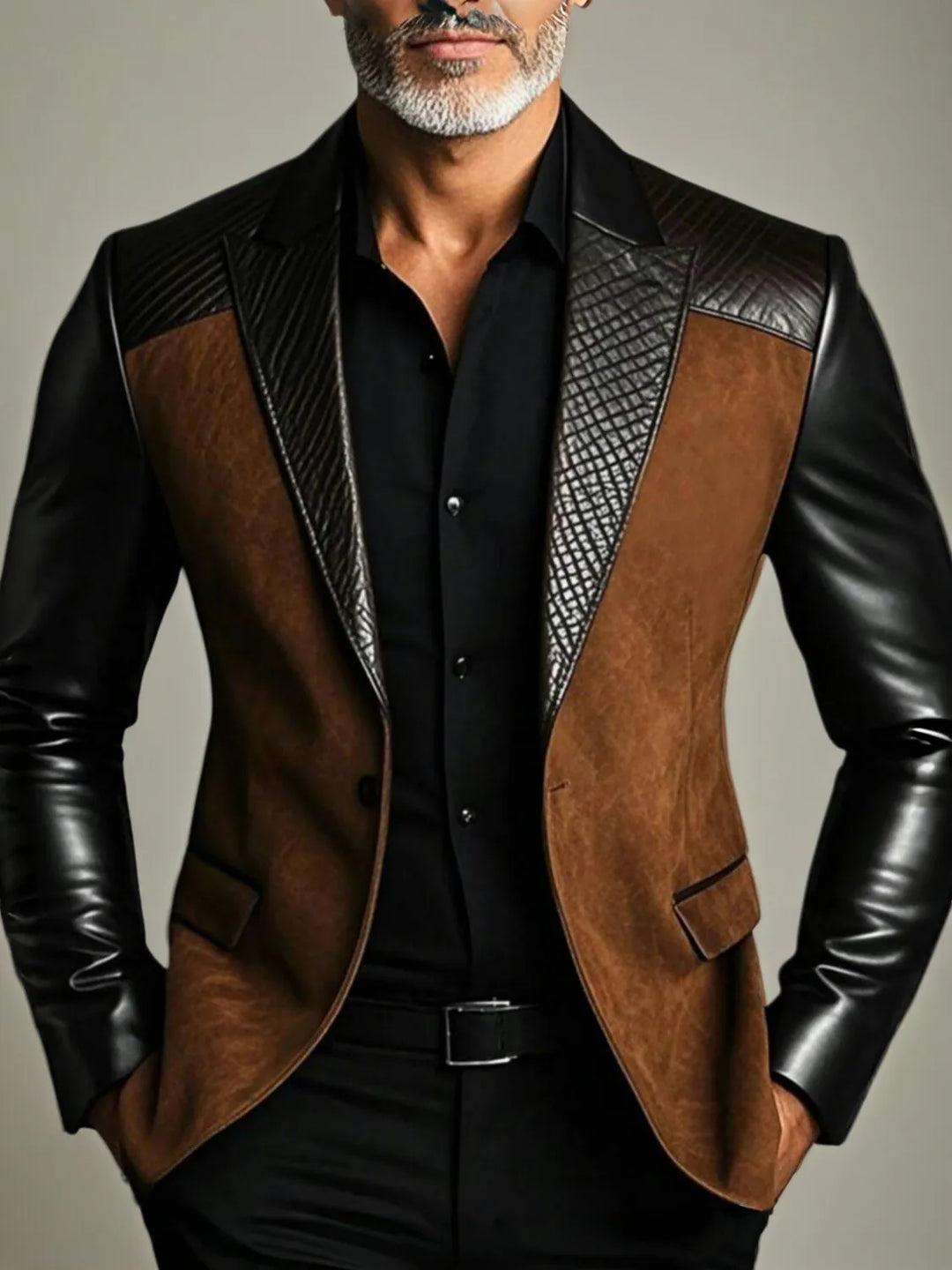 Man wearing a black and brown faux leather blazer with quilted lapel detail