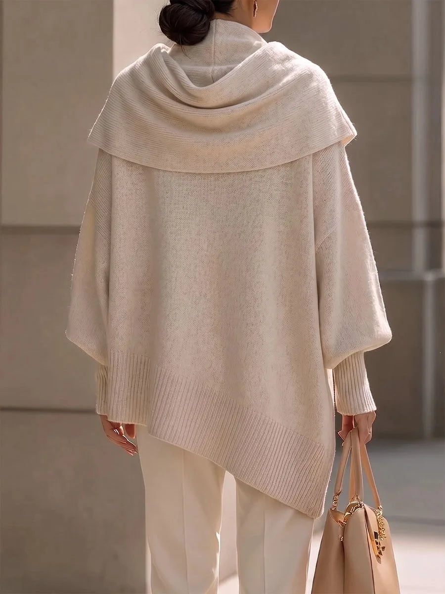 Back view of apricot draped scarf collar poncho sweater