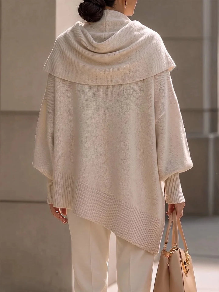 Back view of apricot draped scarf collar poncho sweater