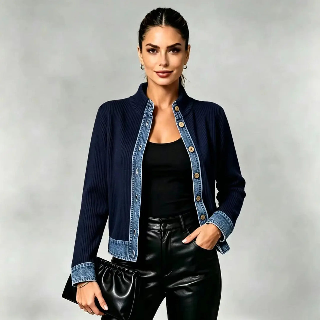 Woman wearing navy blue ribbed cardigan with denim trim
