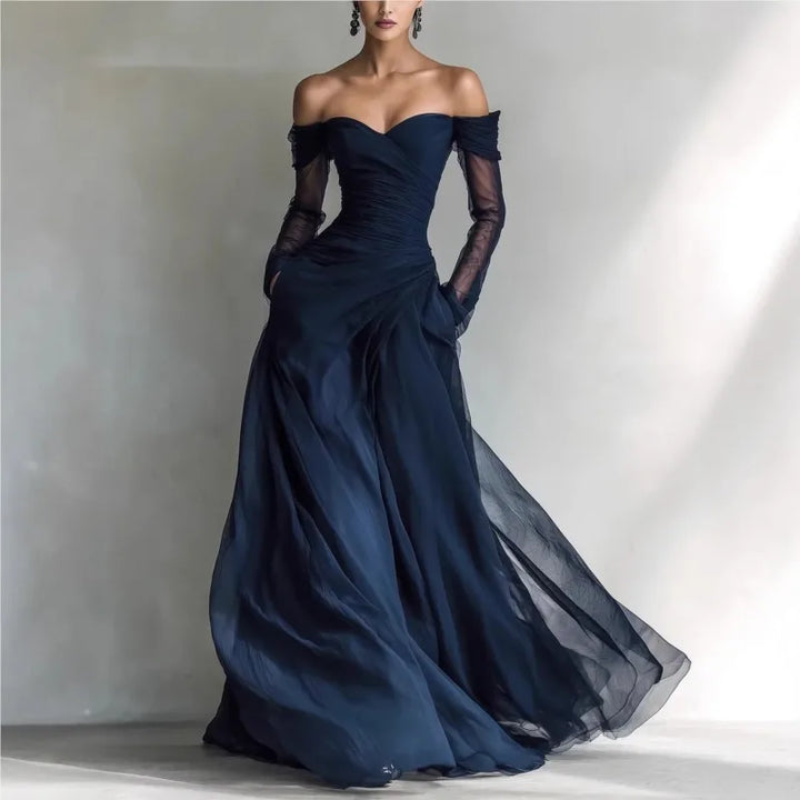 Navy blue off shoulder evening gown with sheer sleeves, front view