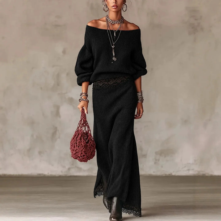 Woman wearing black ribbed knit off shoulder pullover and matching lace trim maxi skirt set