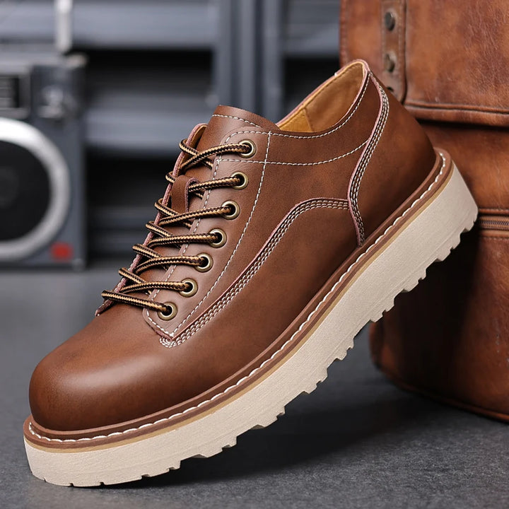 Brown leather oxford shoe side profile with contrast stitching
