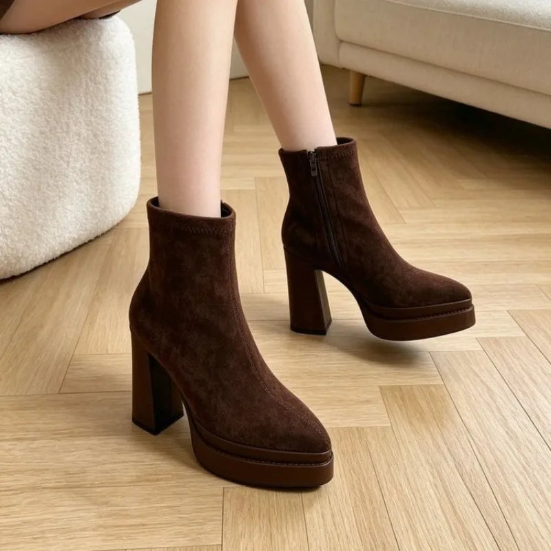 Model wearing brown suede-look platform ankle boots