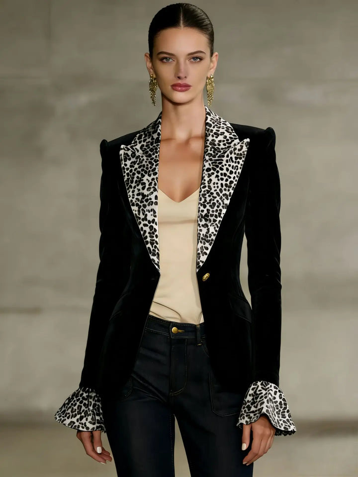 Black velvet blazer with leopard print lapel, close-up front view on model