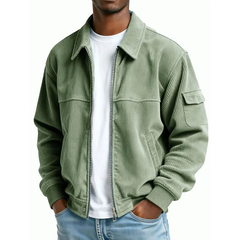 Man wearing sage green corduroy zip jacket with flap pocket