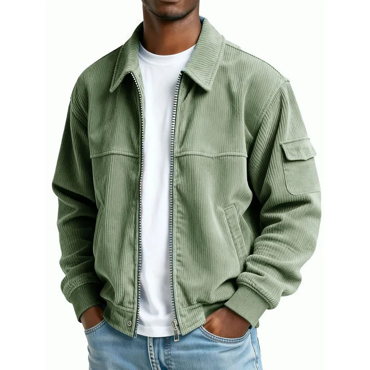 Man wearing sage green corduroy zip jacket with flap pocket