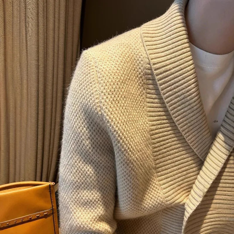 Close up of khaki cardigan waffle knit texture and shawl collar
