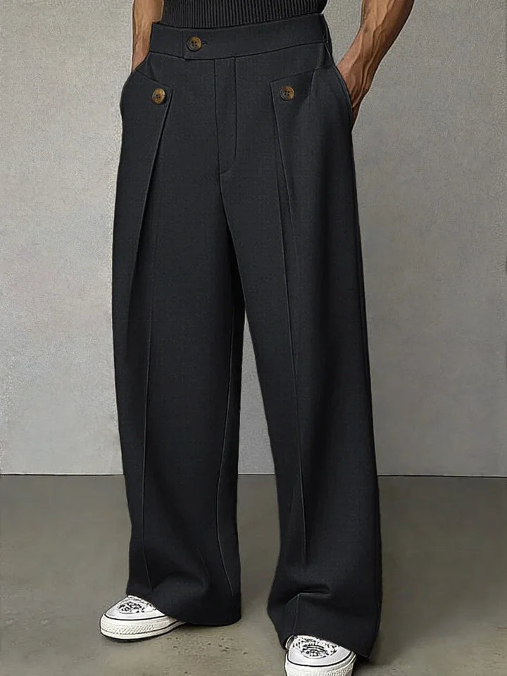 Black wide leg trousers with pleated pocket detail, front view