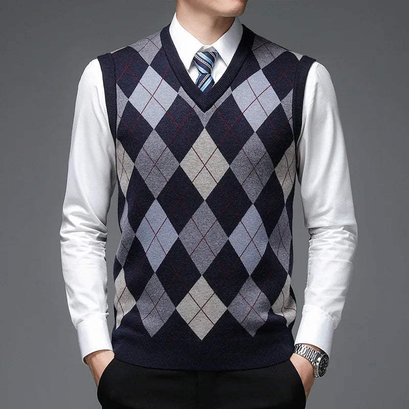 Man wearing navy argyle sweater vest close up view