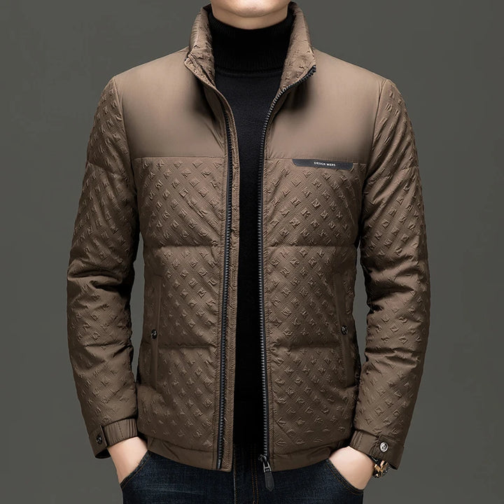 Man wearing brown quilted puffer jacket with stand-up collar, front view