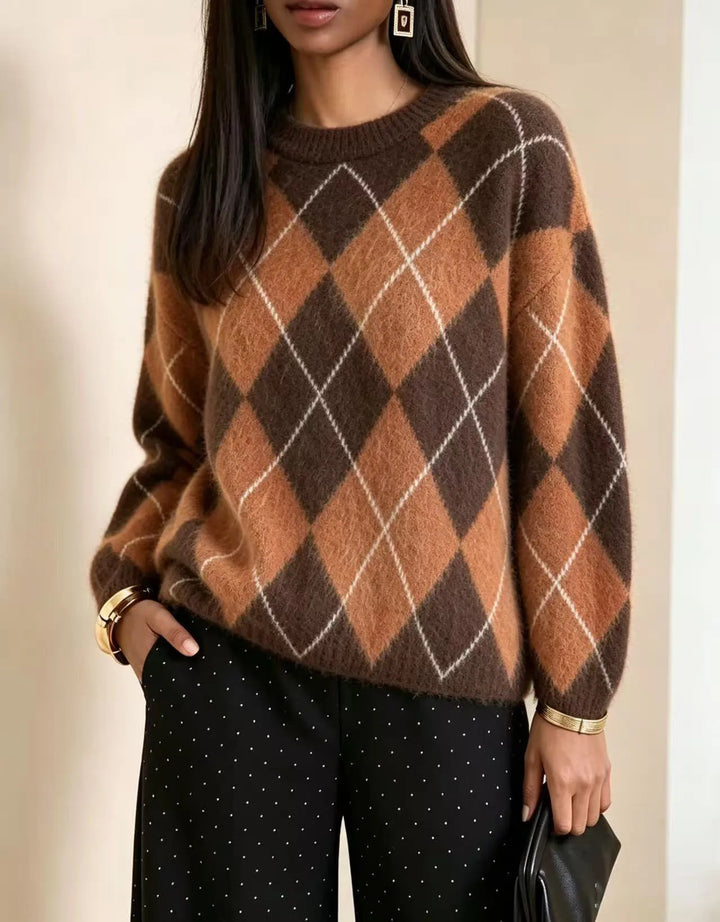 Woman wearing orange and brown argyle knit sweater