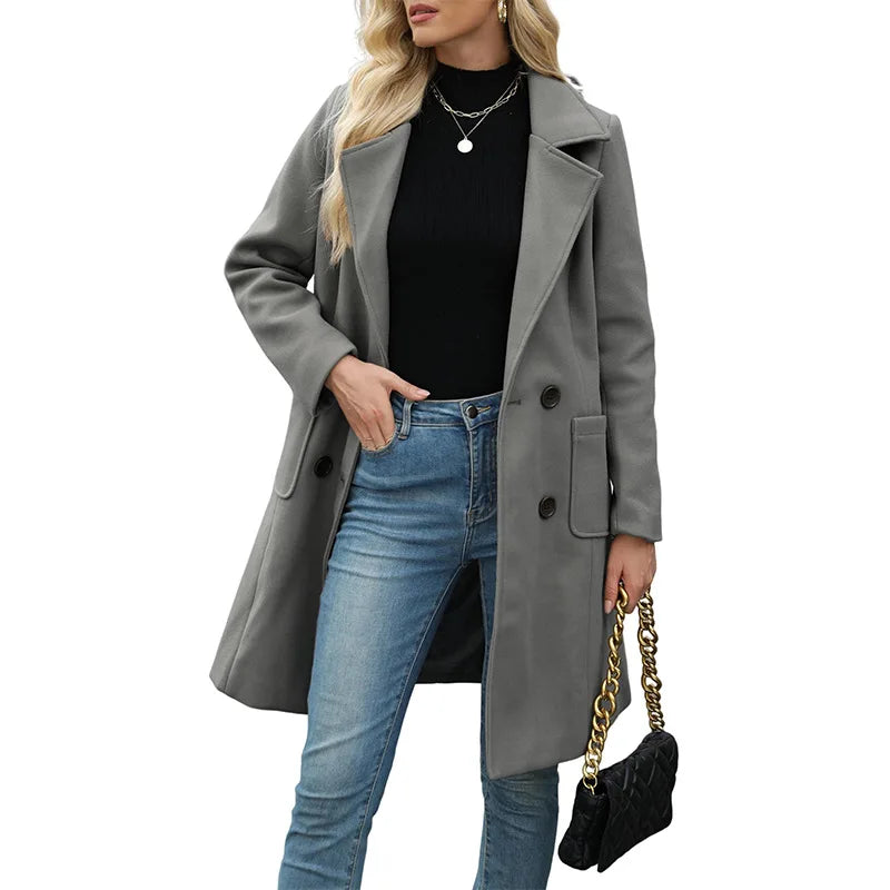 Woman wearing gray double breasted wool coat