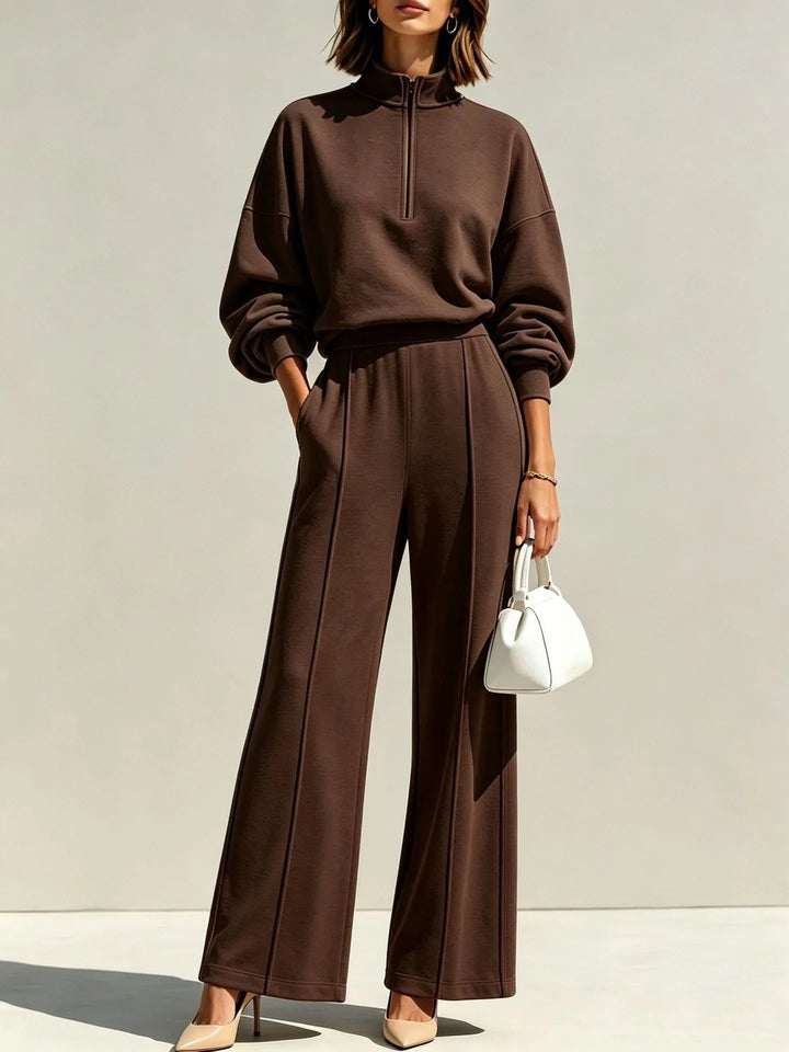 Woman wearing brown quarter zip pullover and wide leg pant set