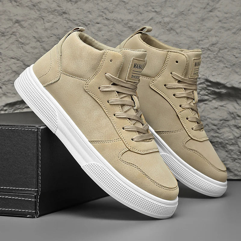 Khaki high-top sneakers leaning on shoe box