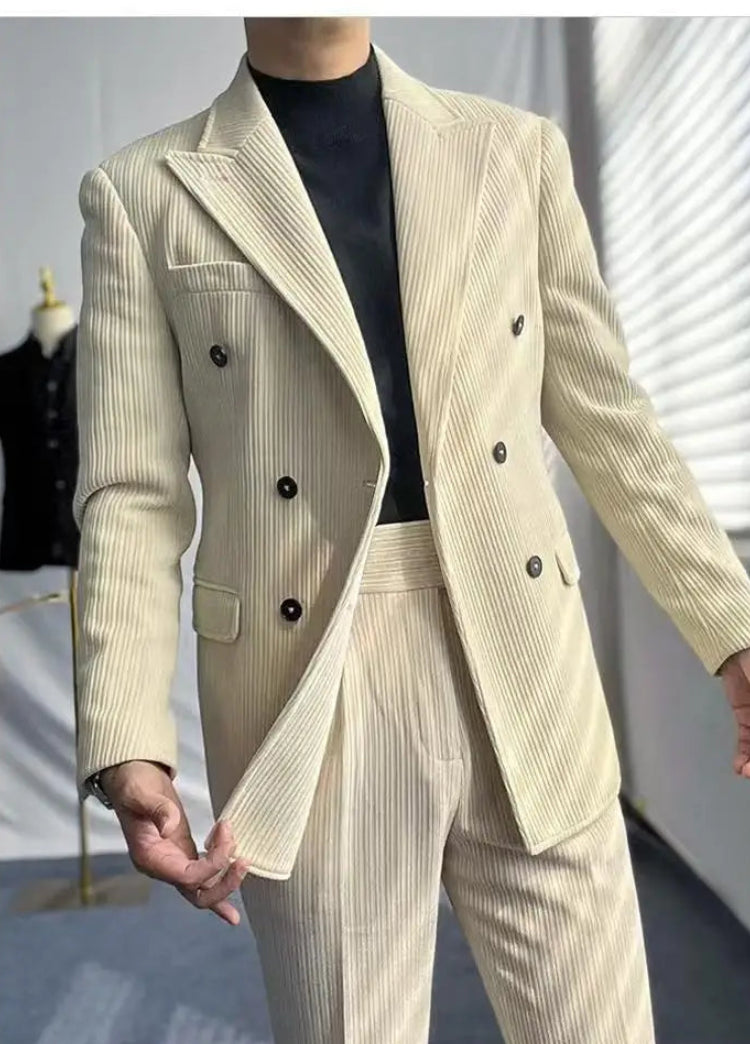 Man wearing beige corduroy suit jacket open front view