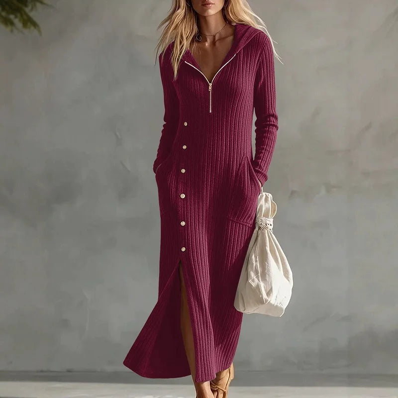 Woman wearing wine red hooded ribbed knit maxi dress with button front and side slit