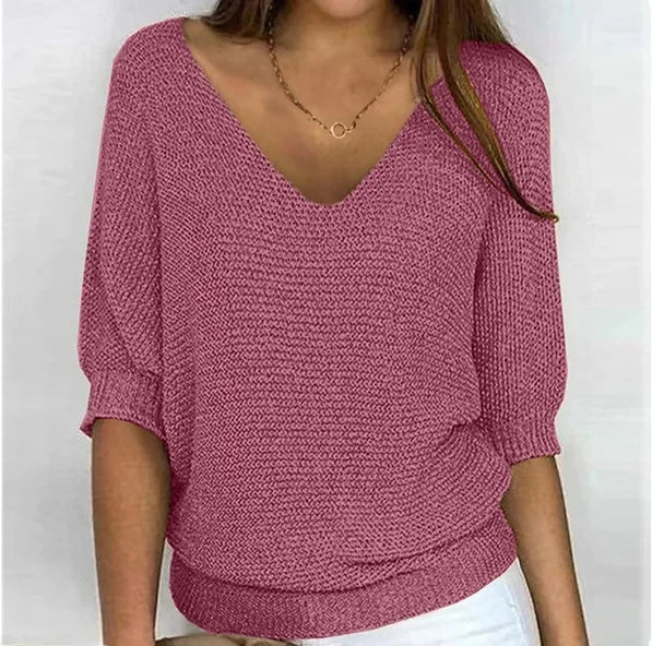 Pink V-neck knit sweater with three-quarter sleeves