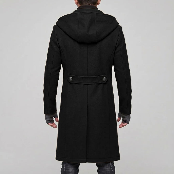 Back view of black hooded trench coat with back button tab
