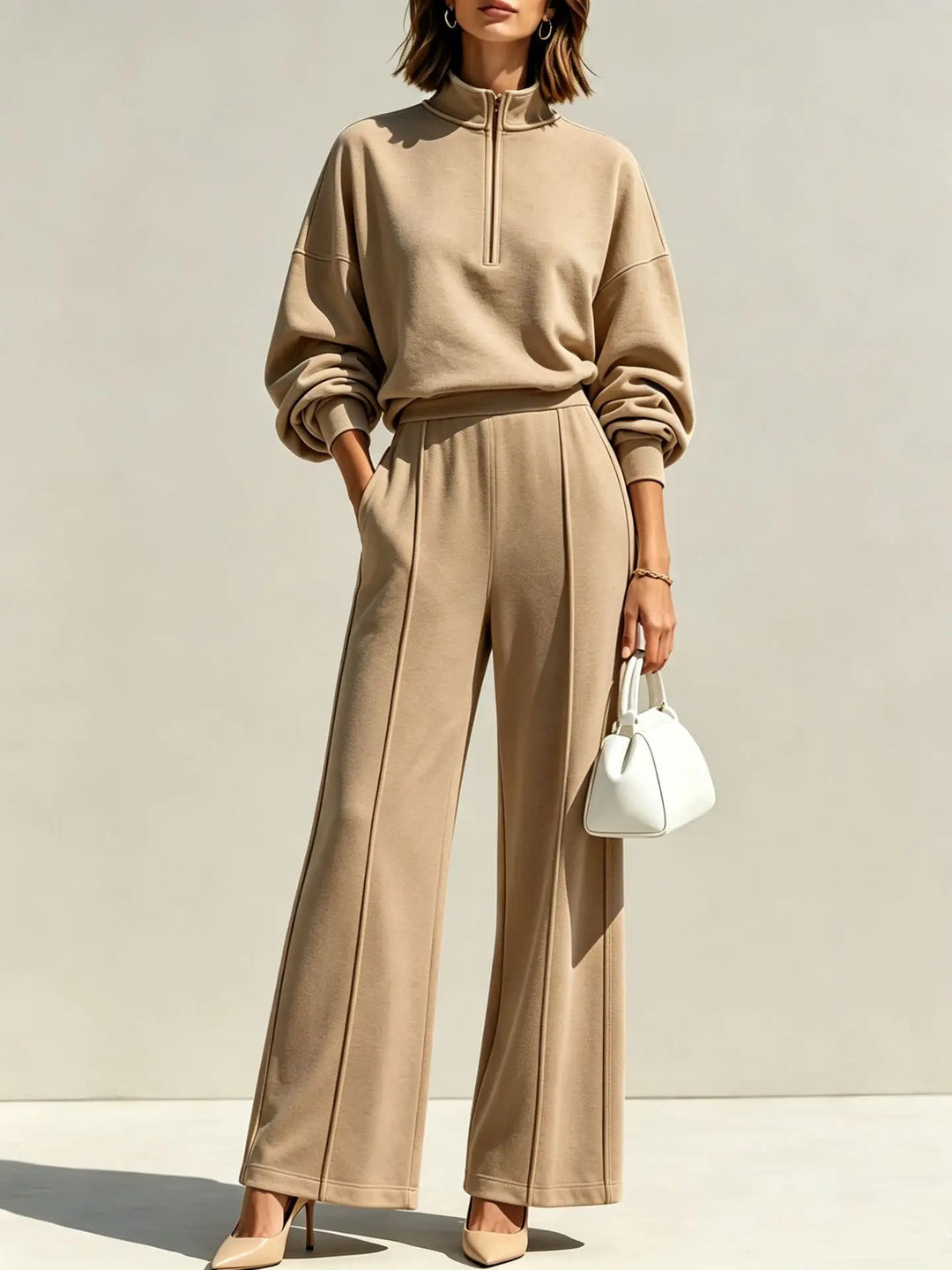 Woman wearing khaki half zip pullover and wide leg pants set