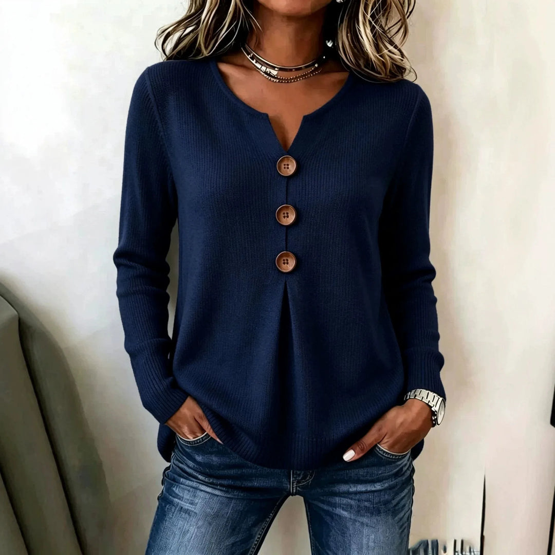 Navy blue ribbed henley top with button placket, front view