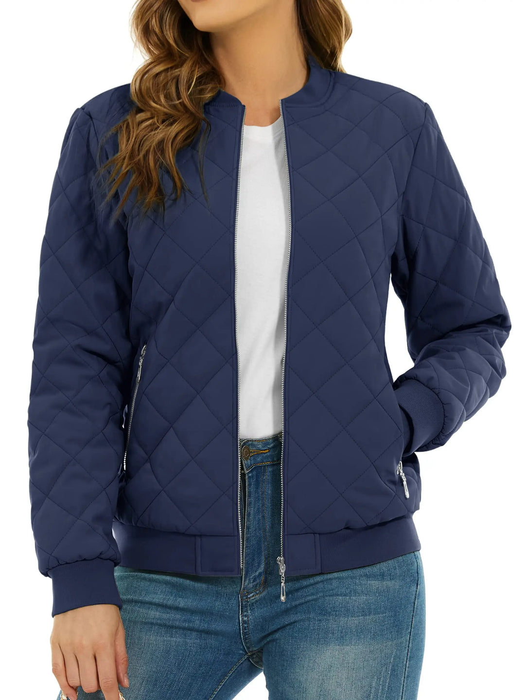 Close up of navy quilted bomber jacket with zip pocket