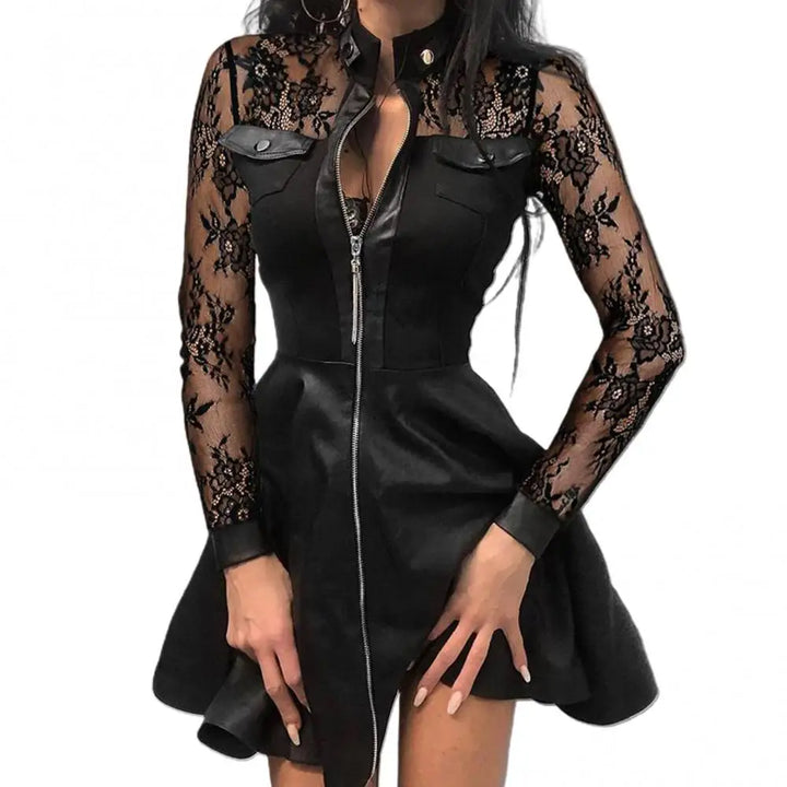 Close up of lace sleeve and front zip detail on mini dress