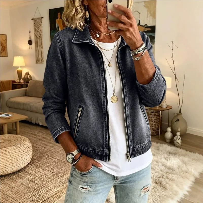 Woman wearing gray denim zip front jacket