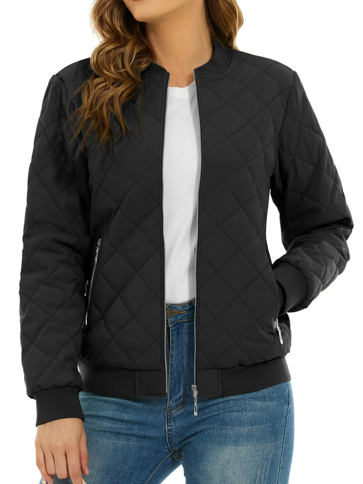 Close up of black quilted bomber jacket with zip pocket