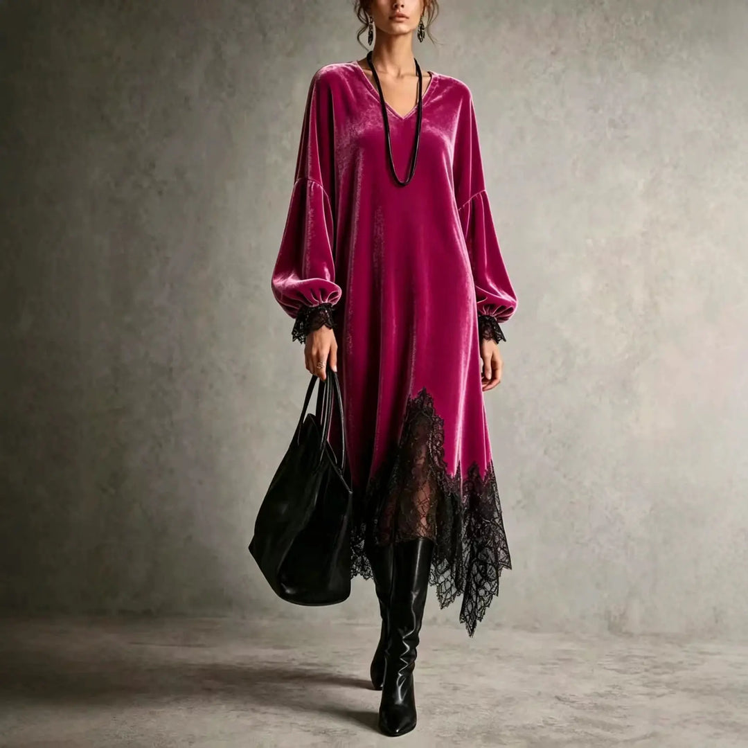 Woman wearing rose red velvet midi dress with lace hem and lantern sleeves