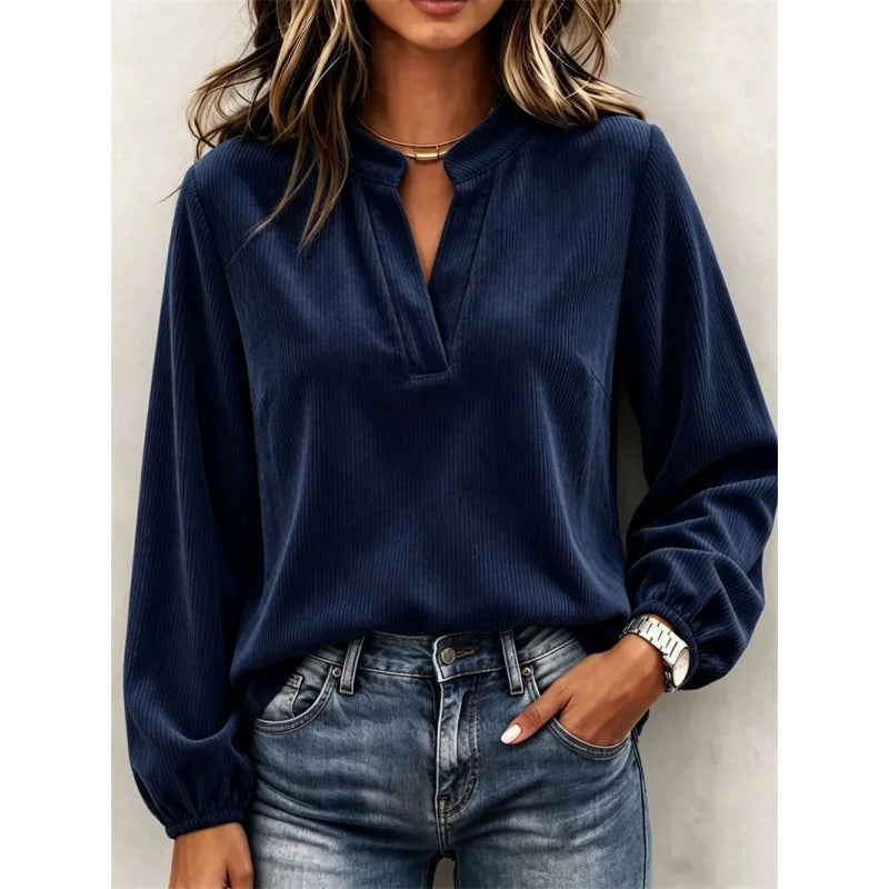 Navy blue ribbed corduroy blouse with V-neck, front view
