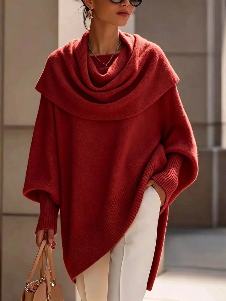 Woman wearing burgundy draped scarf collar poncho sweater
