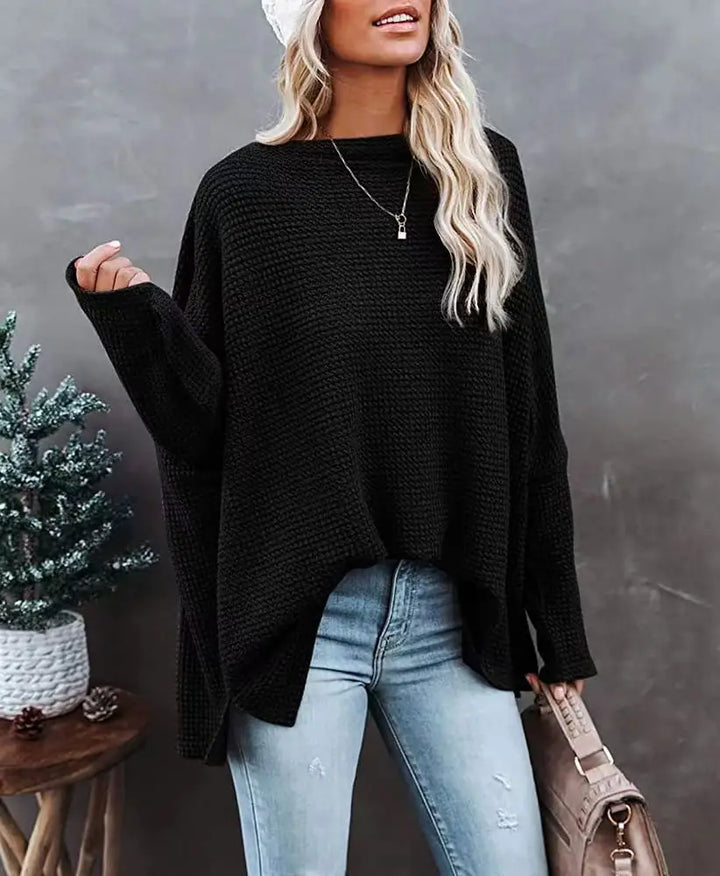 Black waffle knit sweater with crew neckline on model