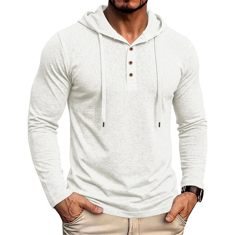 Man wearing white drawstring hooded pullover with half-button placket, front view