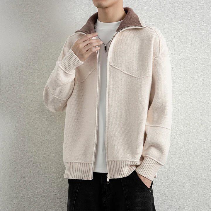 Man wearing beige knit zip cardigan with brown collar
