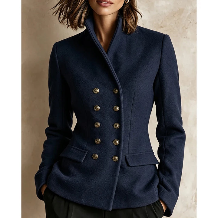 Woman wearing navy blue double-breasted wool-blend jacket, front view