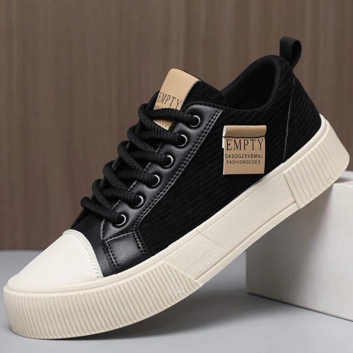 Black corduroy low top platform sneaker side view