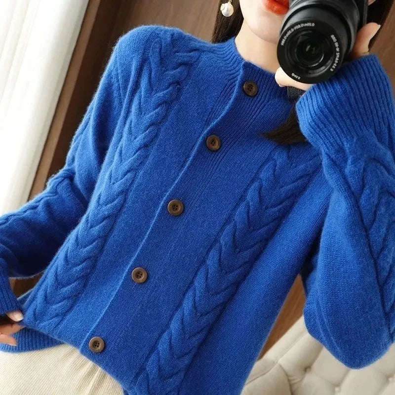 Blue cable knit cardigan, front button detail